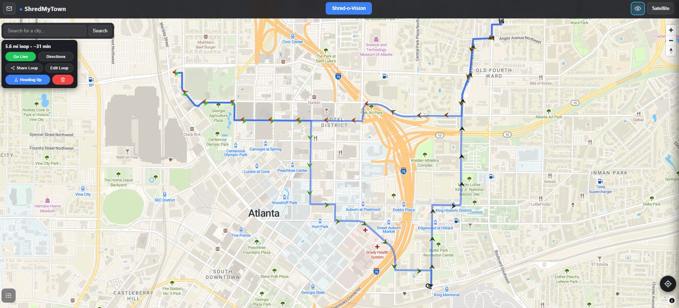 ShredMyTown.com — a GPS route planner showing a 5.6-mile loop through Atlanta with color-coded roads and live navigation controls