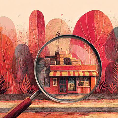 A magnifying glass looking closely at a small storefront